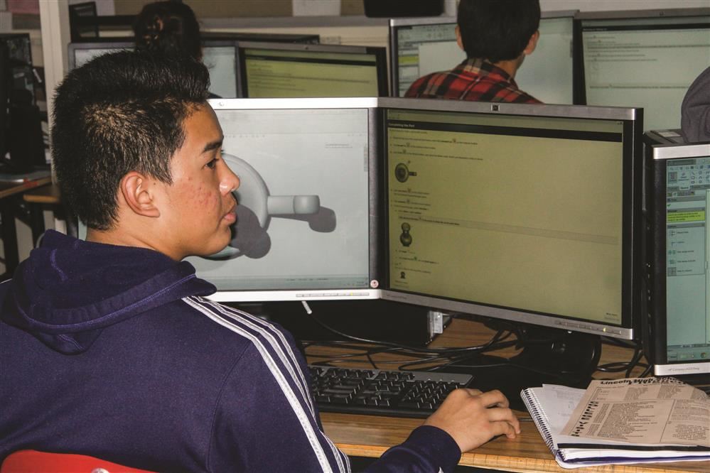 student on computer student on computer